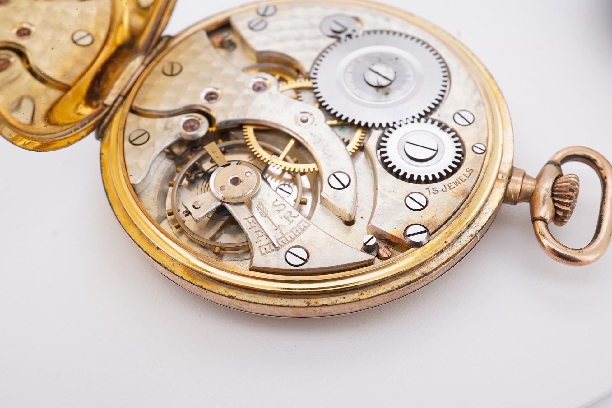 A damaged continental 18k lever pocket watch, together with a rolled gold pocket watch in similar condition.
